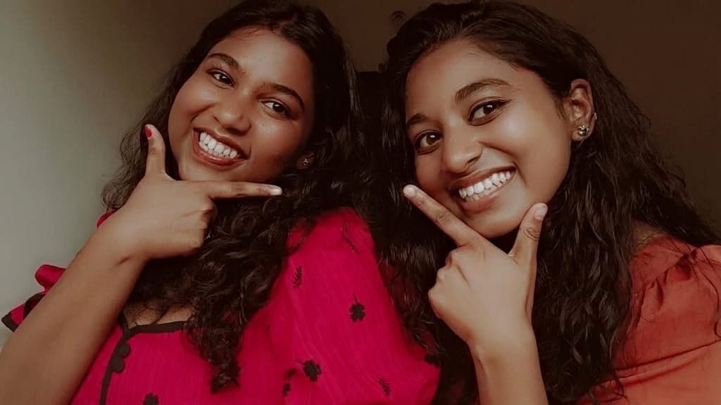 Two smiling Tuskaè visitors